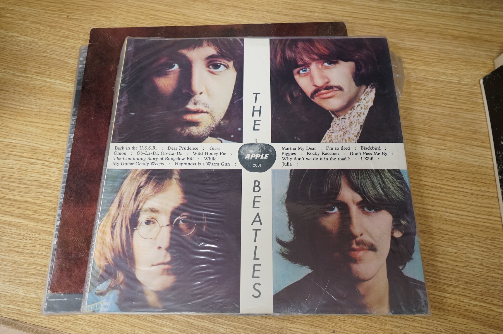 Seven The Beatles LP record albums including; Rubber Soul, two copies of Revolver, The Beatles Vol.1 - Chilean pressing, Love Songs, John Lennon; Rock ‘n’ Roll, Paul McCartney RAM - Chilean pressing.